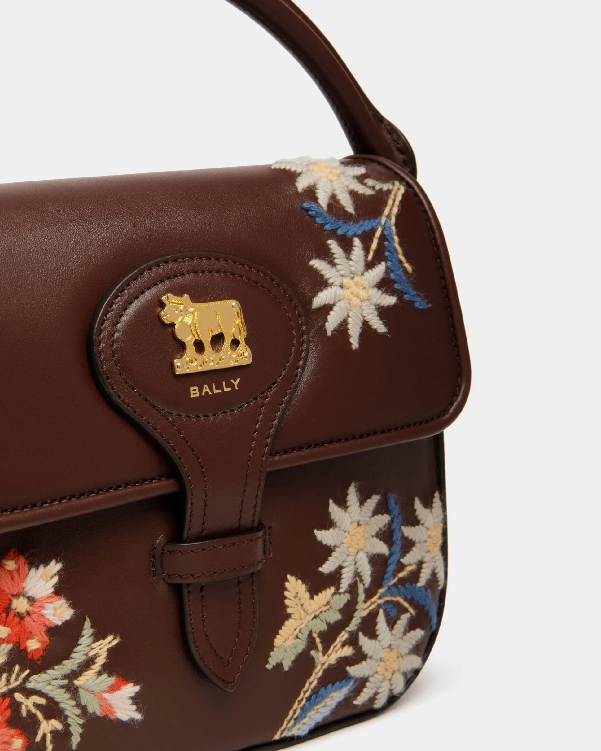 Winter Capsule Minitasche Aus Kastanienbraunem Leder Mit Alpenblumen